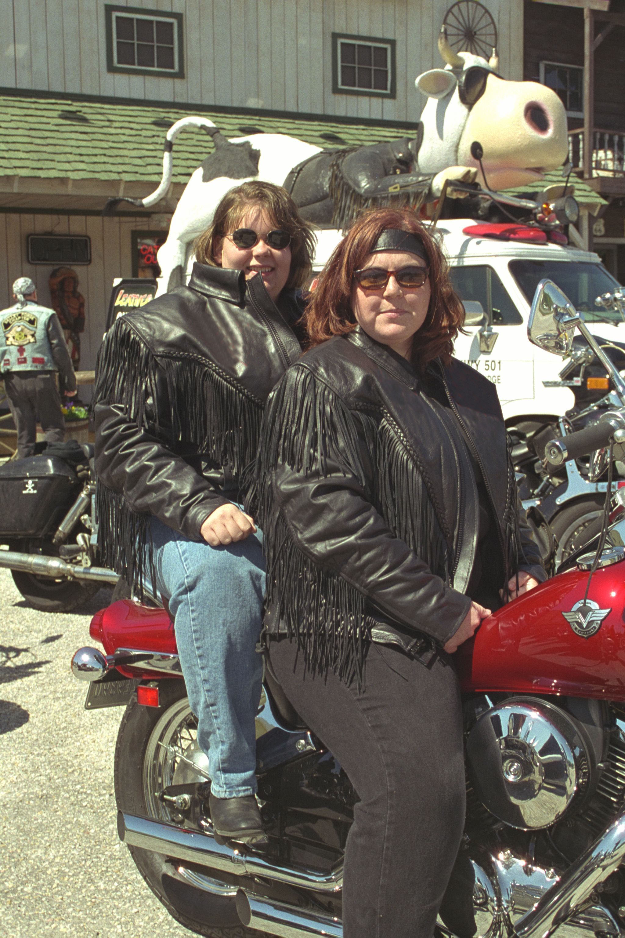 lady riders wearing plus sized leather jackets with fringes