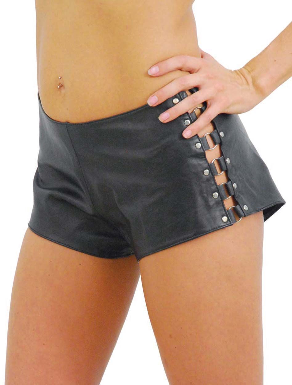 lady rider wearing black leather booty shorts with o rings